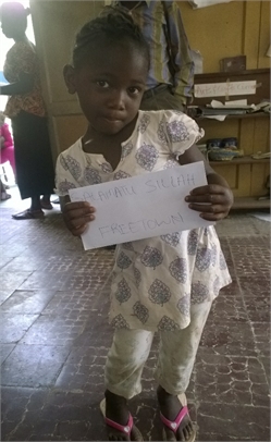 Salamatu posing with her sponsorhip funds